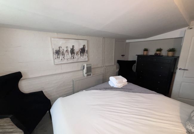 Two double bedrooms in the Stags Head Apartment at Richmond Park Hotel, ideal for families or groups.