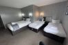 Richmond Park Hotel Family Room with a king bed and two single beds, perfect for a family of 4 in Bo'ness.